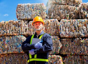 Recycling waste plastic worker istock thirawatana phaisalratana 1323488098